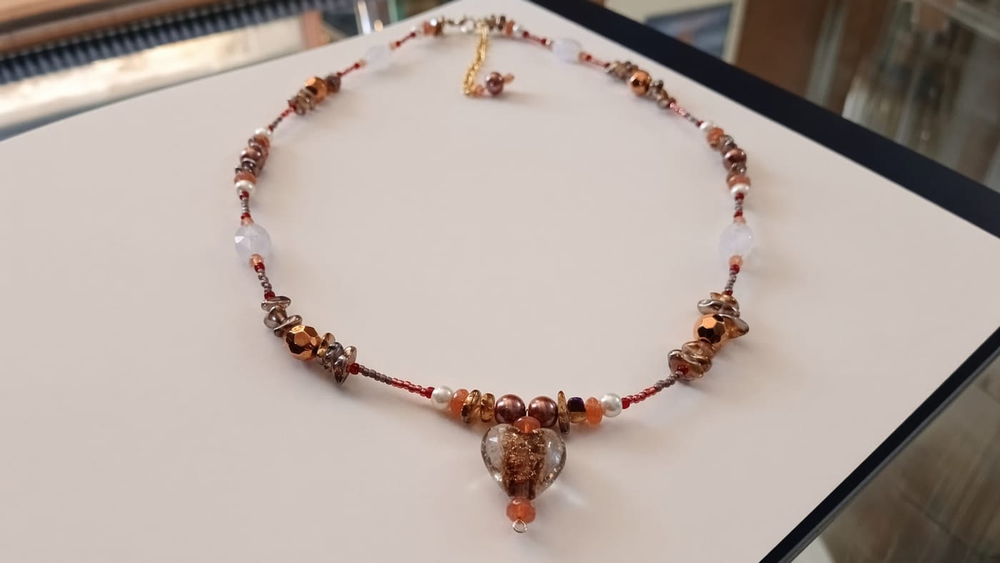 Handcrafted Kreations 4 Karla beaded necklace with a copper swirl glass heart